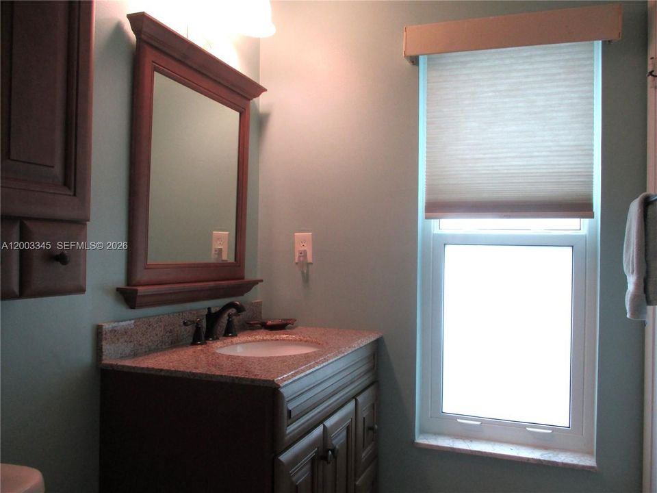 MASTER BATH WITH NATURAL LIGHT FROM WINDOW