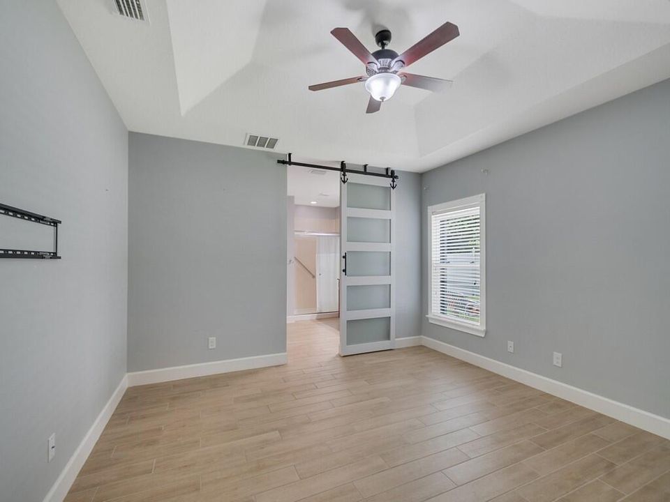 OWNERS BEDROOM WITH BARN DOOR