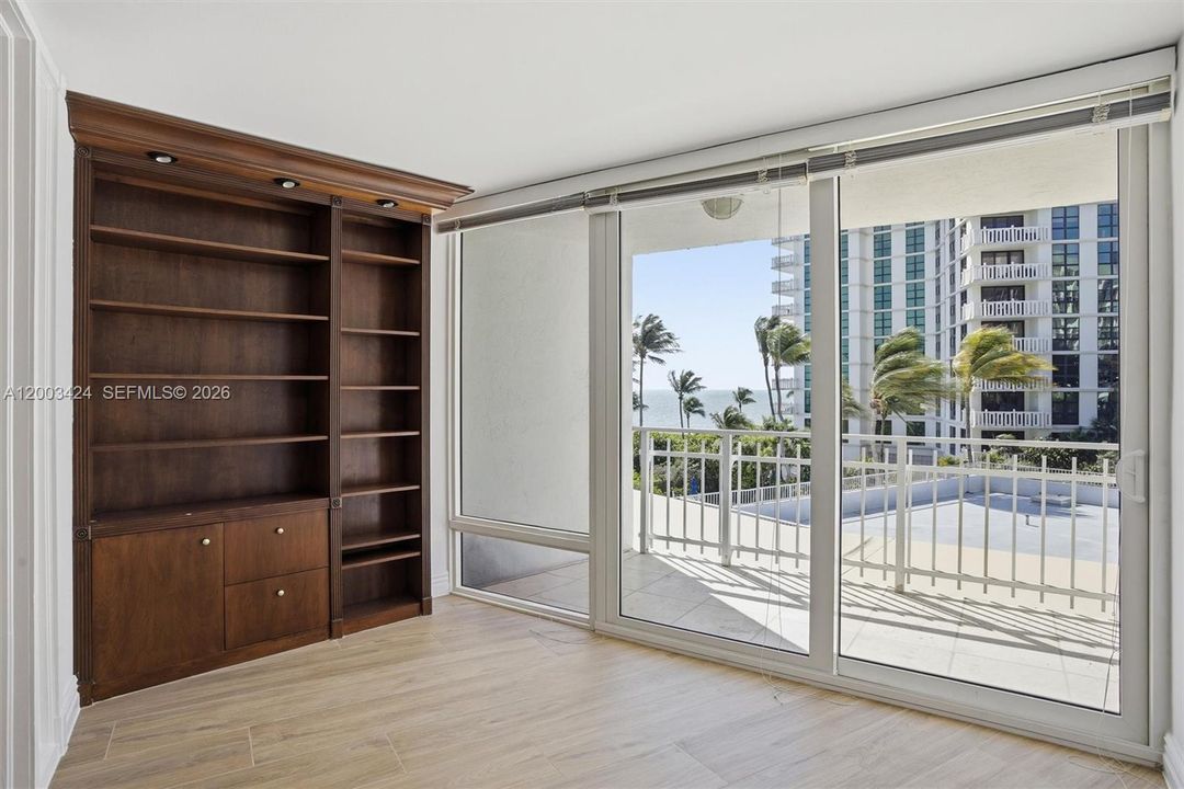 Office, enclosed balcony. Cabinet painted WHITE