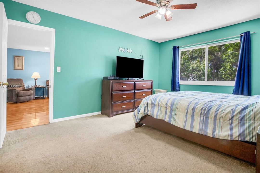 PRIMARY BEDROOM WITH IMPACT WINDOW