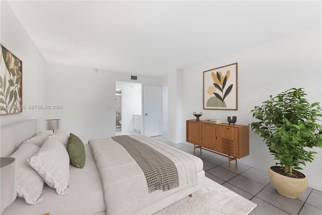 Main Bedroom - Balcony entrance, with large walk- in closet. Balcony access over looking the pool area.