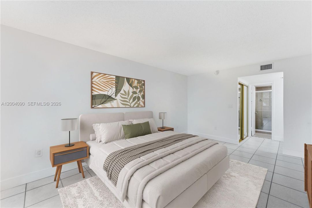Main Bedroom - Balcony entrance, with large walk- in closet.