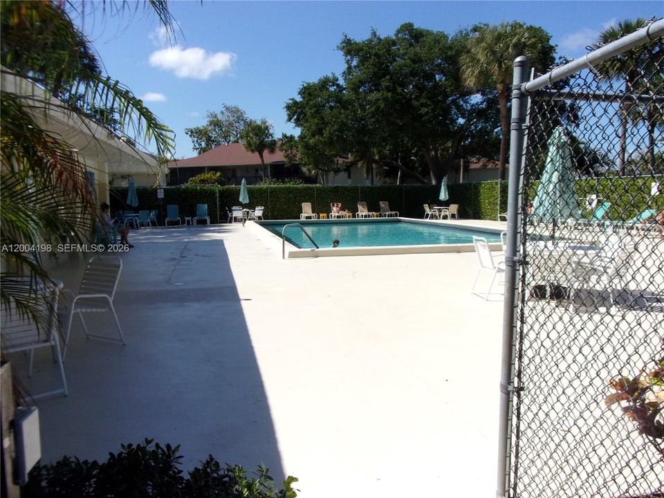 The unit is the building just east of the heated community pool and clubhouse