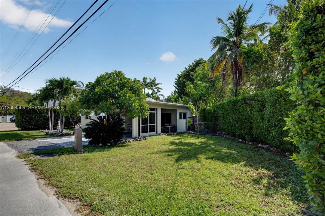 Spacious yard with room for a boat or future expansion.