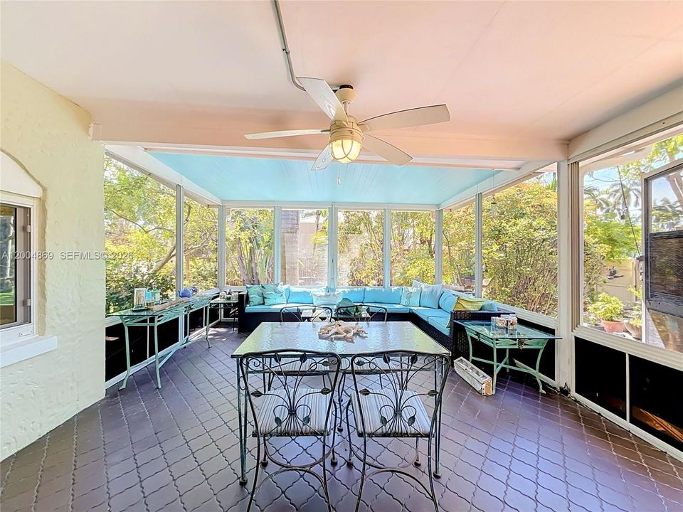 Huge screened porch overlooking pool and yard