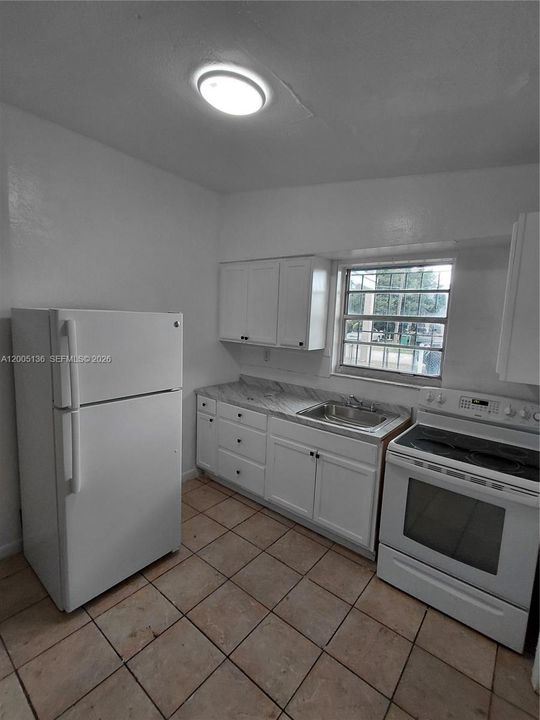 Activo con contrato: $329,000 (3 camas, 1 baños, 800 Pies cuadrados)