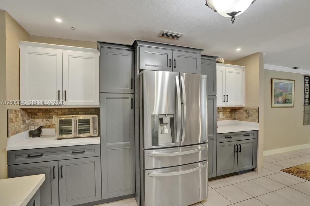 Dual pantries on either side of refrigerator