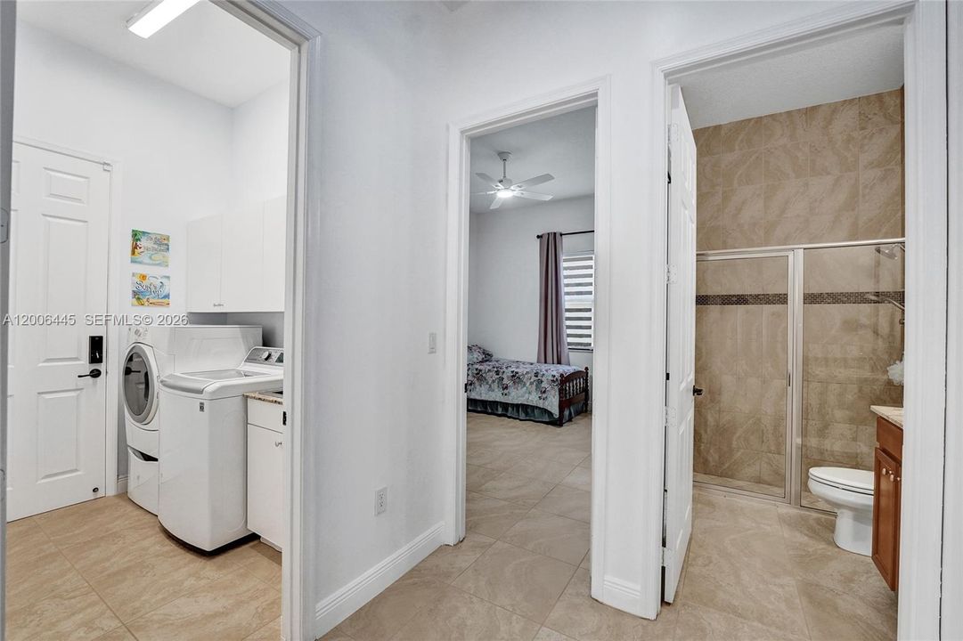 Laundry room, bedroom #1 and ensuite and guest bathroom
