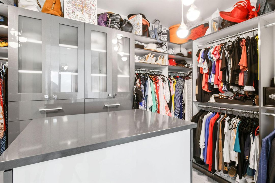 Primary Suite Walk In Custom Closet