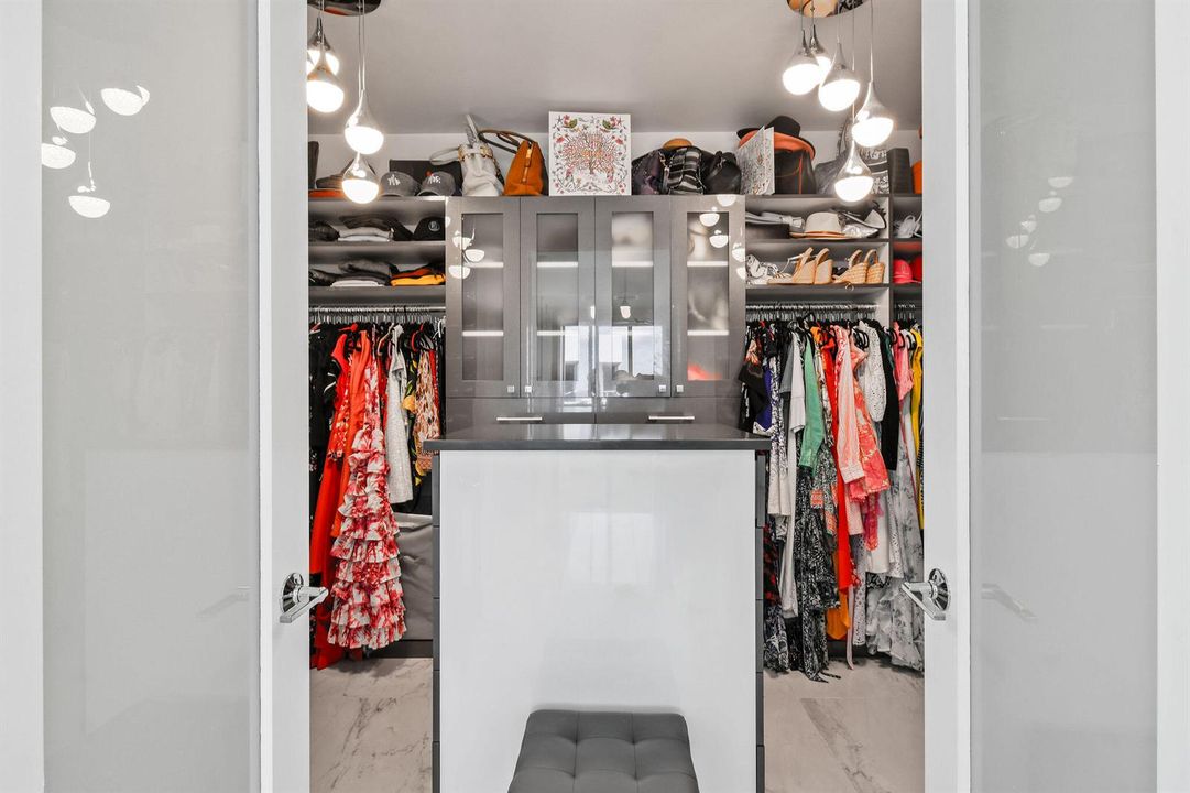 Primary Suite Walk In Custom Closet
