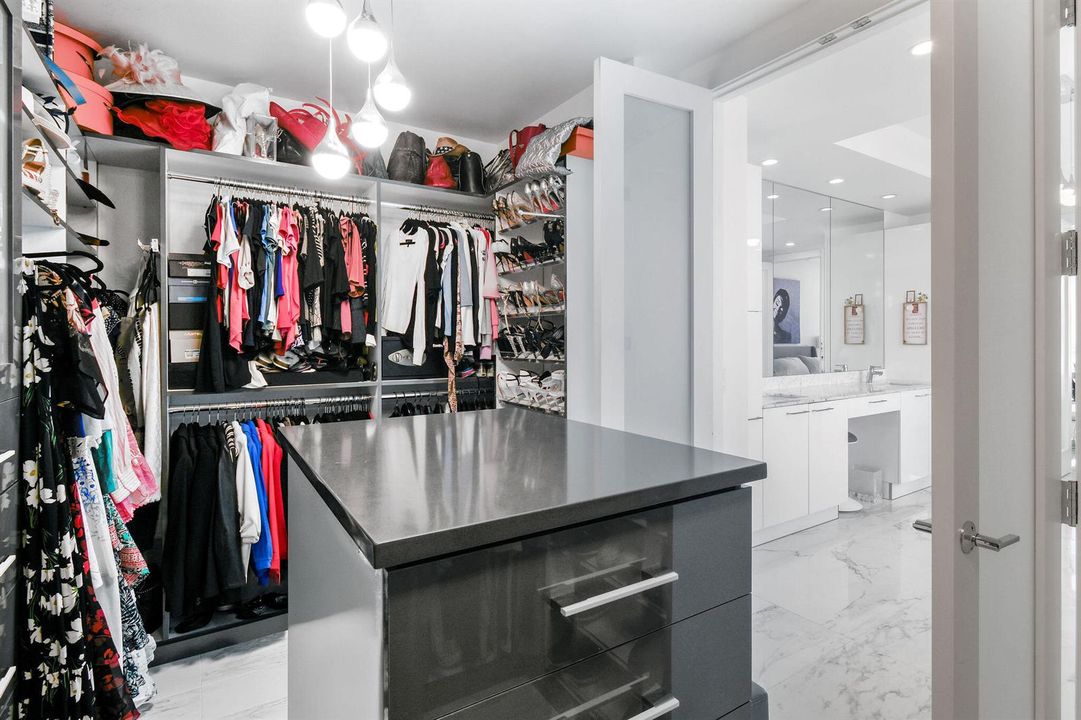 Primary Suite Walk In Custom Closet