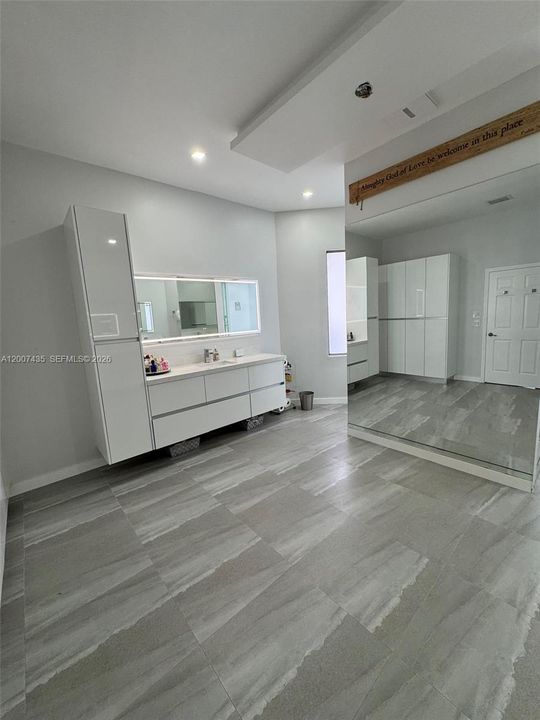 Master Bathroom with plenty of storage. This is the left side.