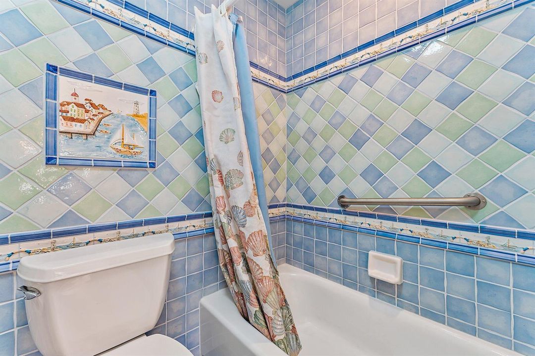 Full bath with beautiful tile work