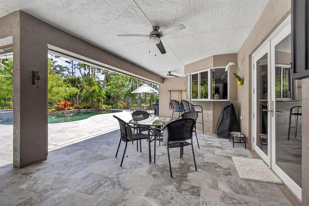 V1 39 Covered Lanai w new travertine dec