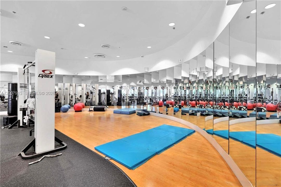 Gym - Dedicated studio space for yoga, stretching, and wellness