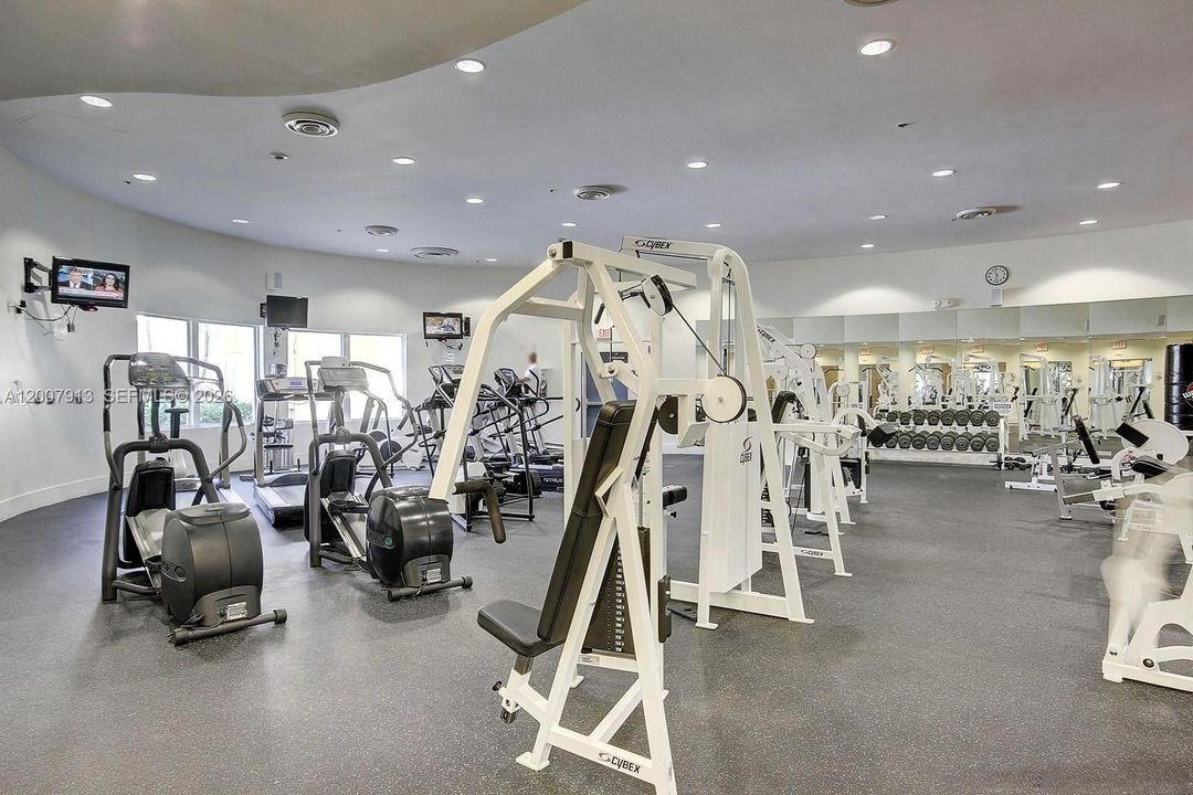 Gym - Fully equipped fitness center with strength and cardio equipment
