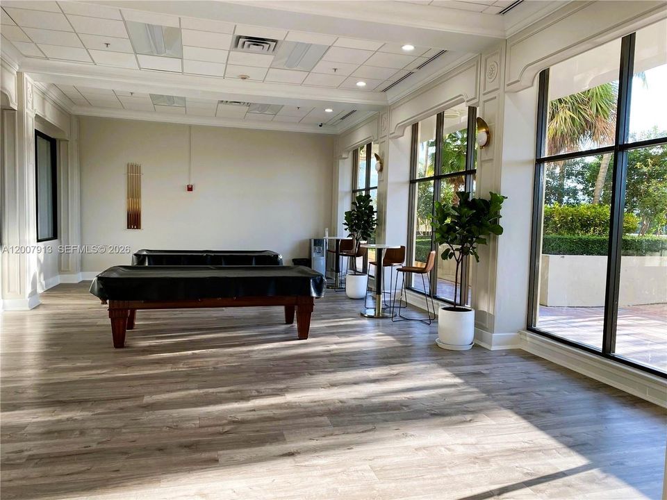 Game Room - Resident lounge with billiards and entertainment space