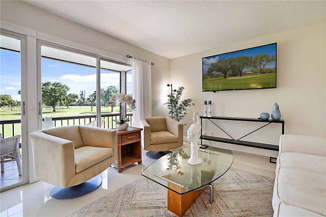 Large living area that opens to balcony