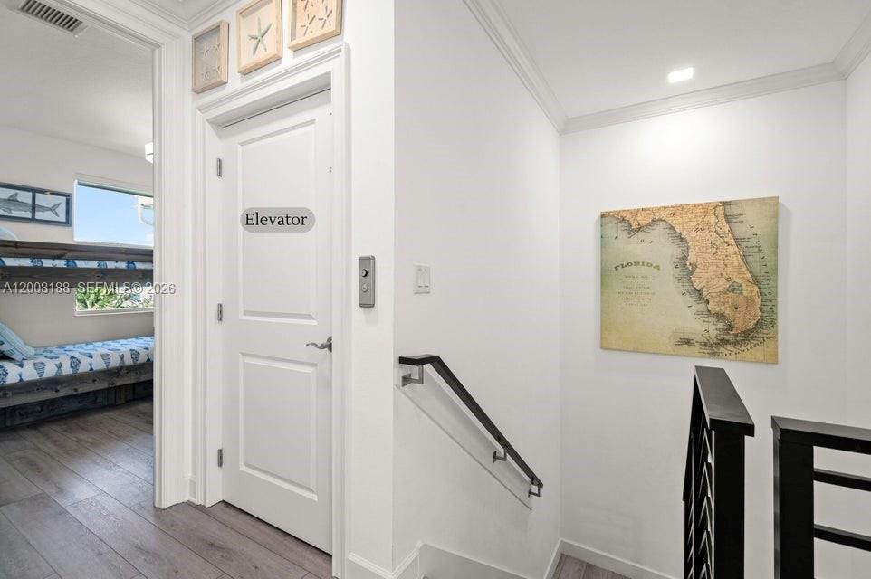 Landing to downstairs, elevator