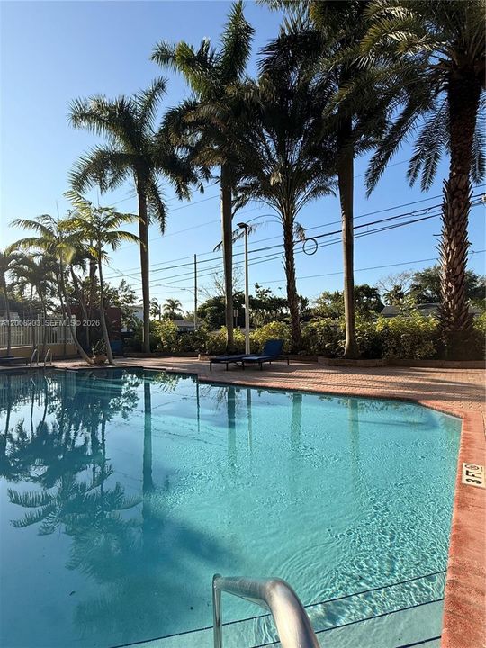 Secure building with 24-hour security and gated entrance and exit.