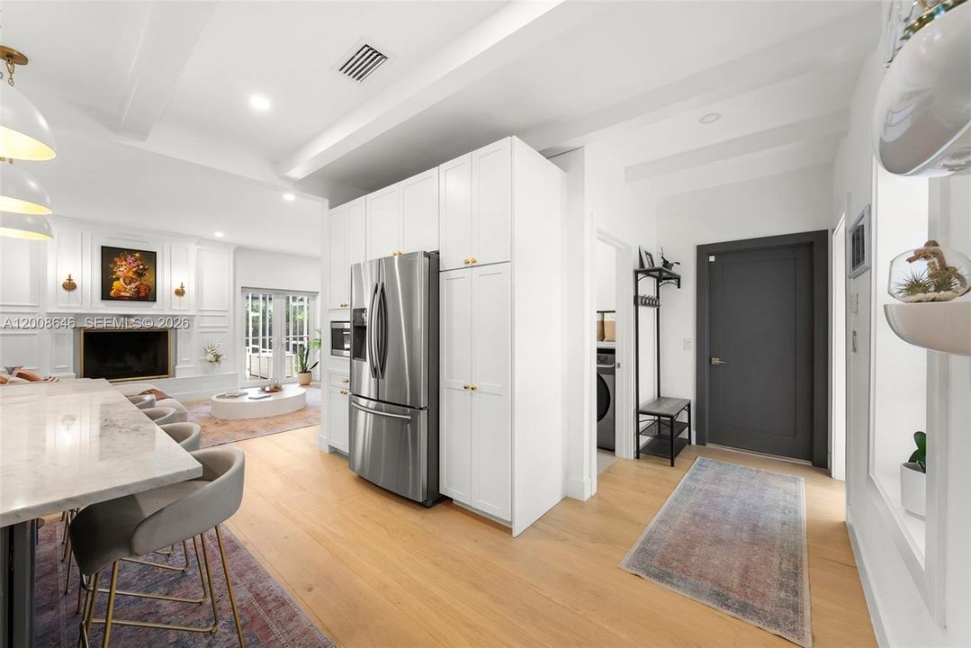 Entrance from Garage Door to the kitchen open space area