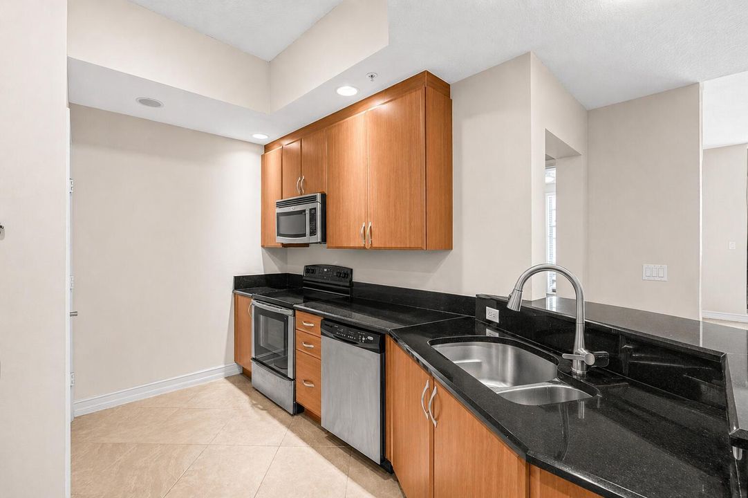 Kitchen w/ Ample Storage & Counters