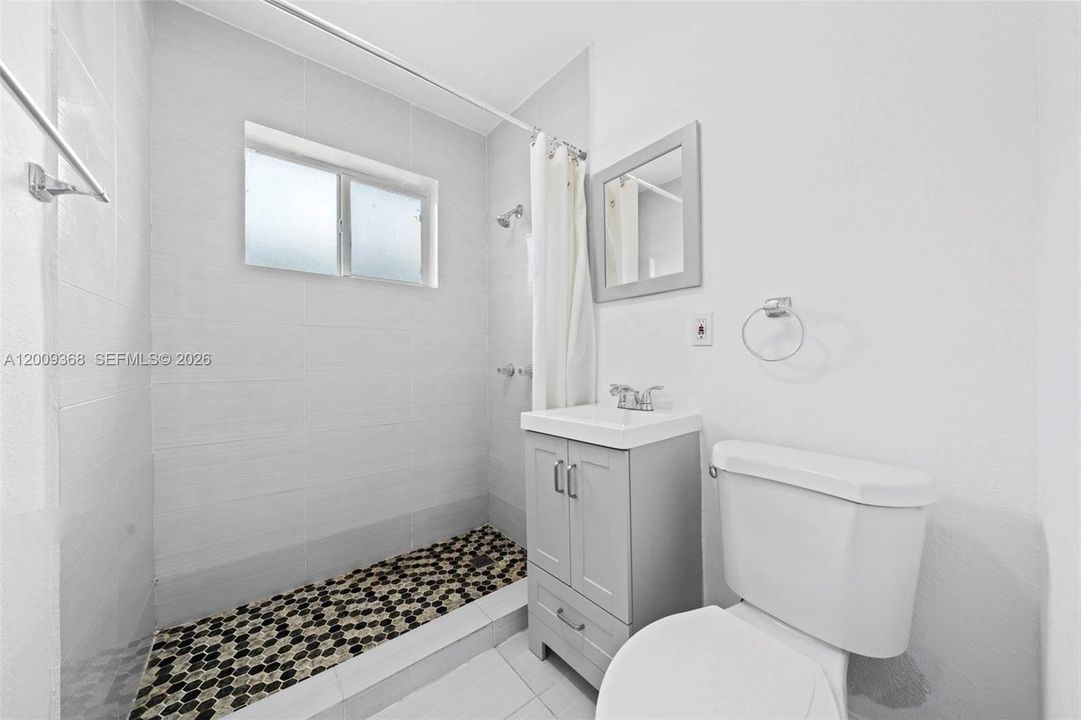 Bathroom of unit 1