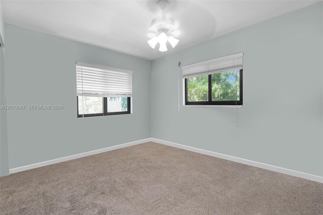 Bedroom 2. Artificially enhanced/decluttered