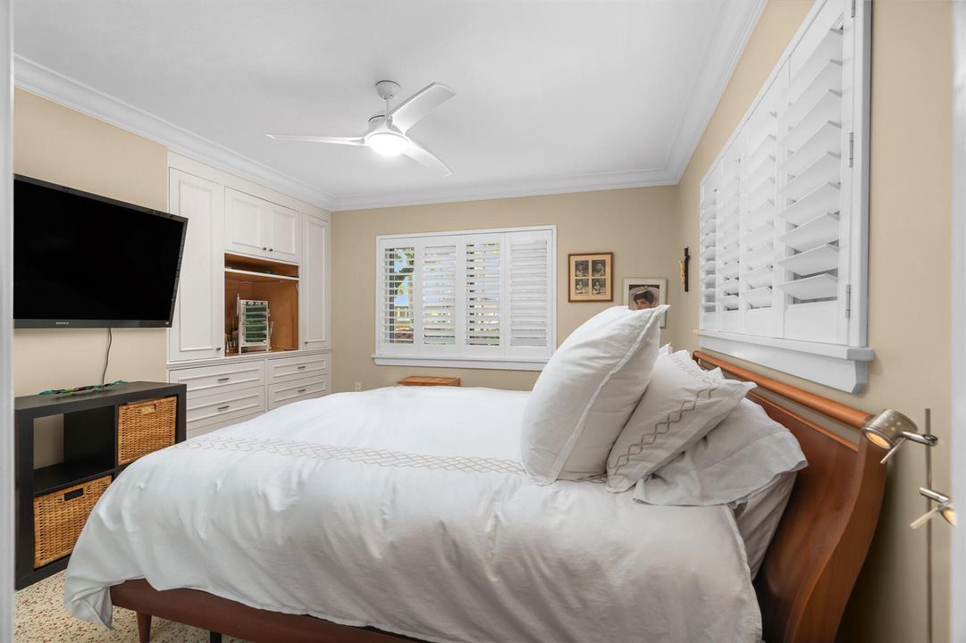 Primary bedroom with Plantation shutters
