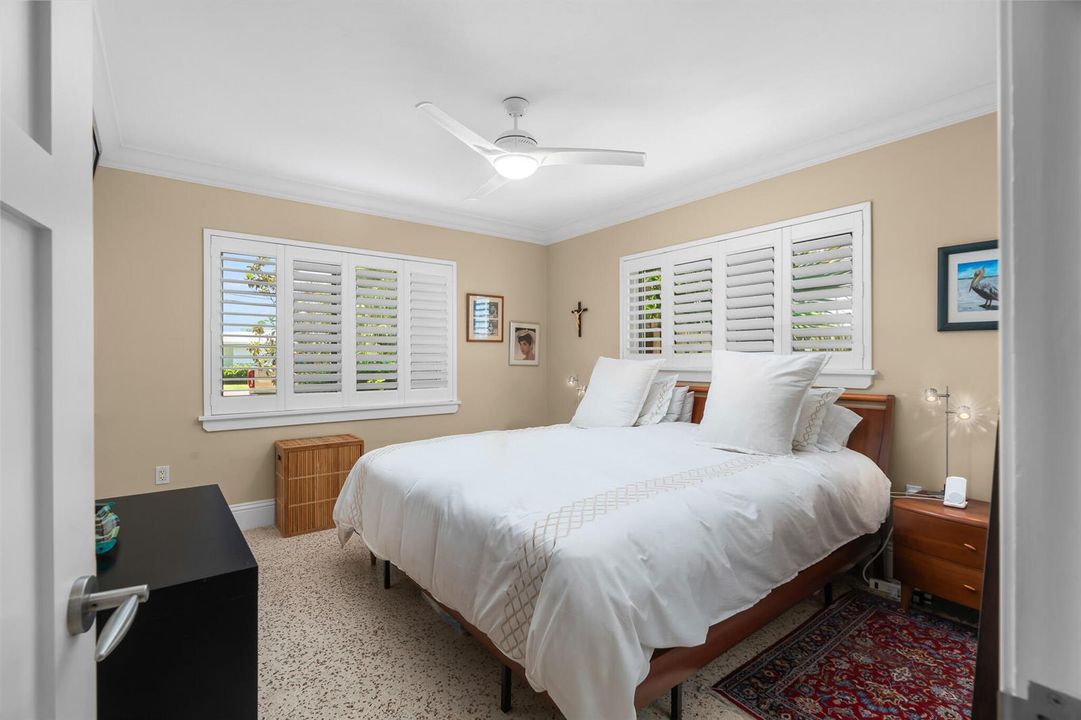 Primary bedroom with Plantation shutters