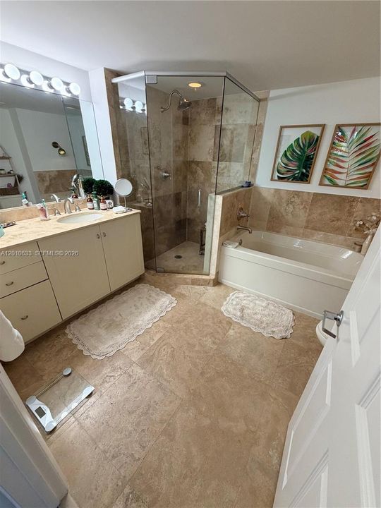 Master Bath with Walk in Shower and Separate Tub