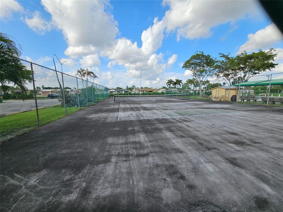 TENNIS COURTS STEPS FROM YOUR FRONT DOOR