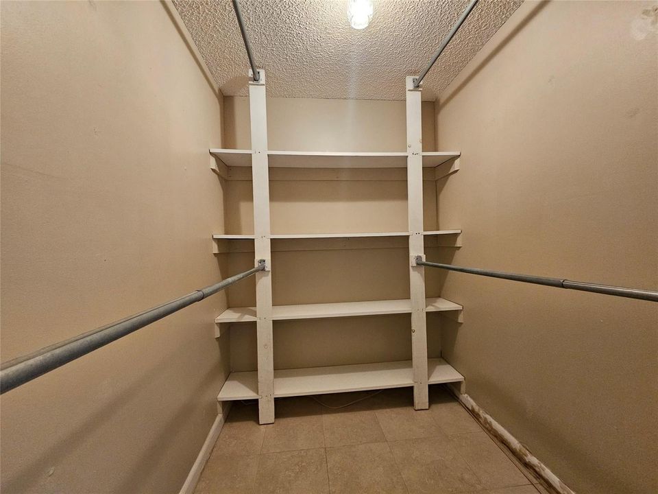 LARGE WALK-IN CLOSET IN PRIMARY BEDROOM