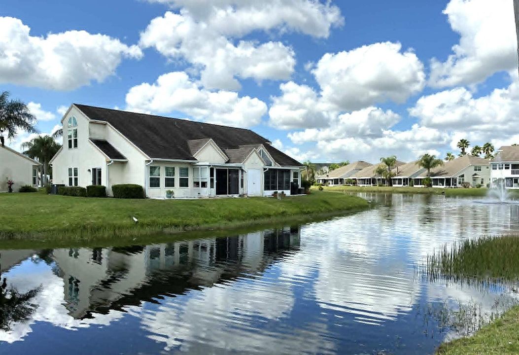 Exterior Back View to Lake, Fountain