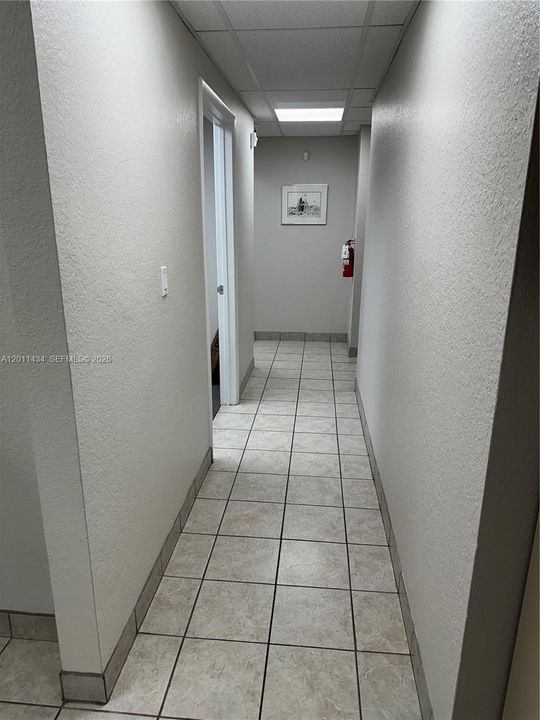 Hallway to conference room & offices