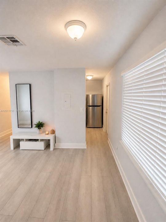 Dining area combined with living area directly from kitchen.