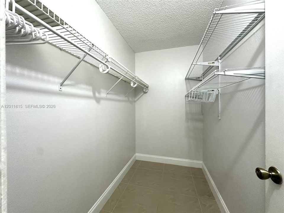 Primary Bedroom Walk in Closet