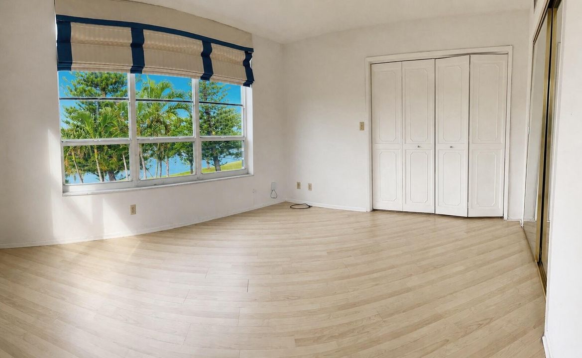 BR3 Bright minimalist room with scenic v