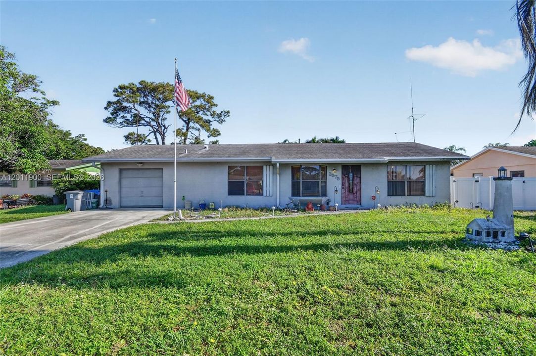 A canal facing home with no HOA & 1 car garage.