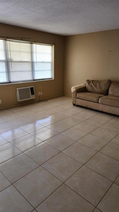 Bright Living room and AC unit