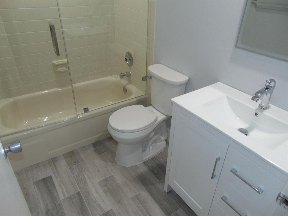 GLASS ENCLOSURE GUEST BATH