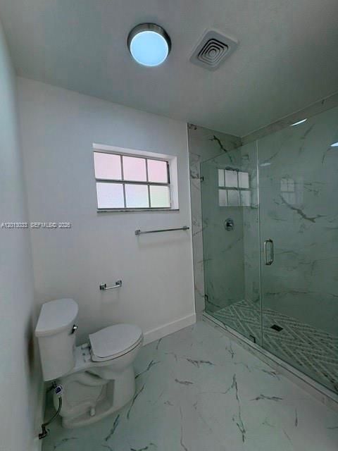 master bathroom toilet & shower