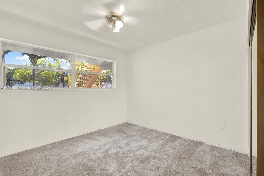Picture has been virtually staged with carpet but there is no capet.  The floor is only cement and ready for you to put whichever flooring might fit you best.