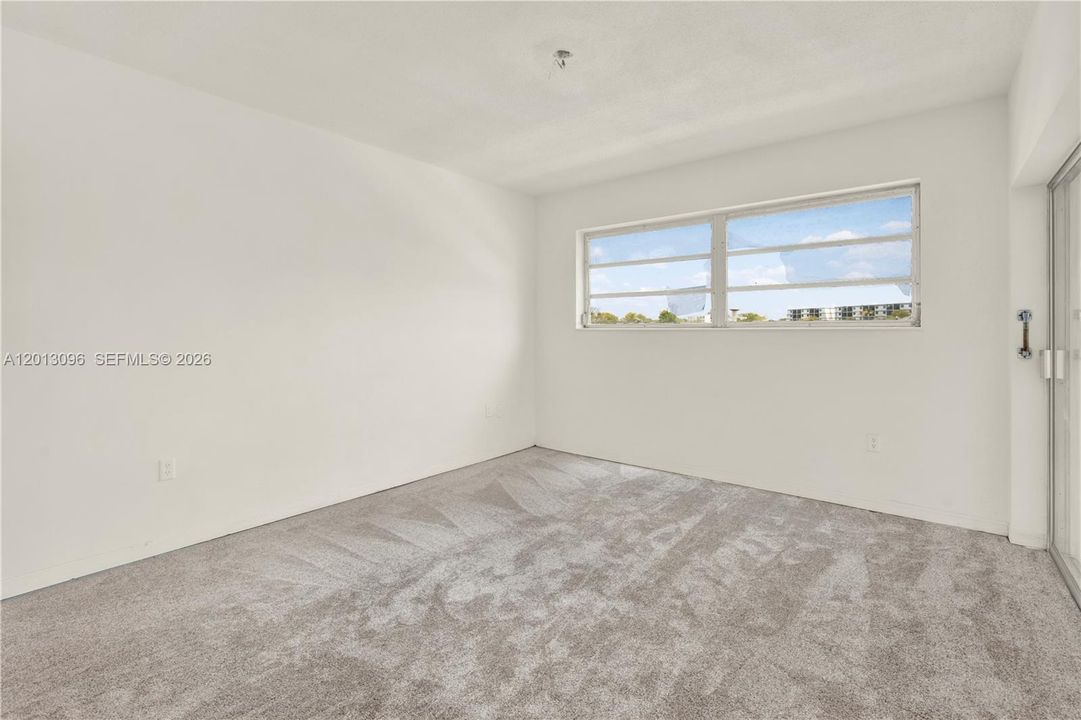 Picture has been virtually staged with carpet but there is no capet.  The floor is only cement and ready for you to put whichever flooring might fit you best.