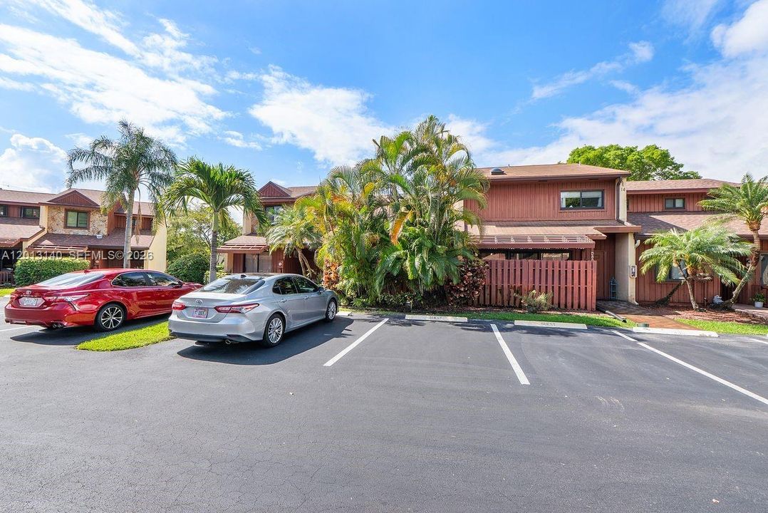 Unit has 2 spaces, and ample guest parking
