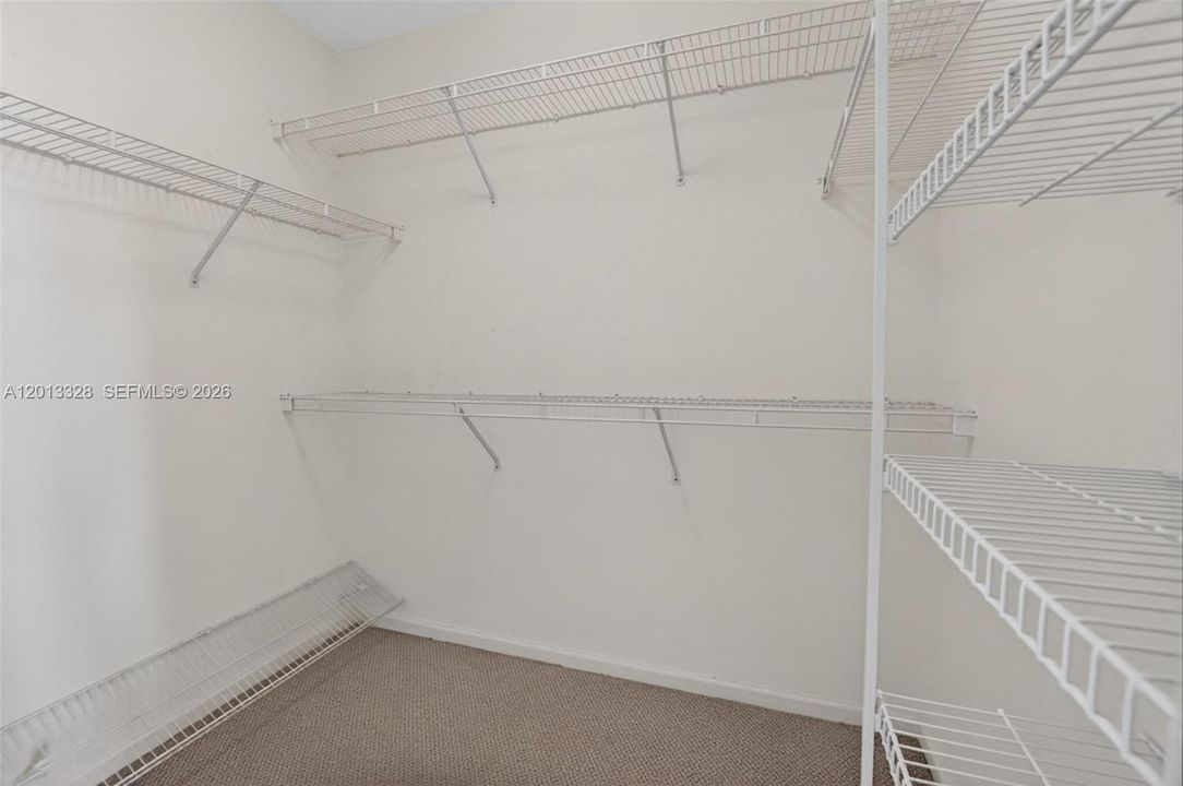 Walk in closet in Primary bedroom