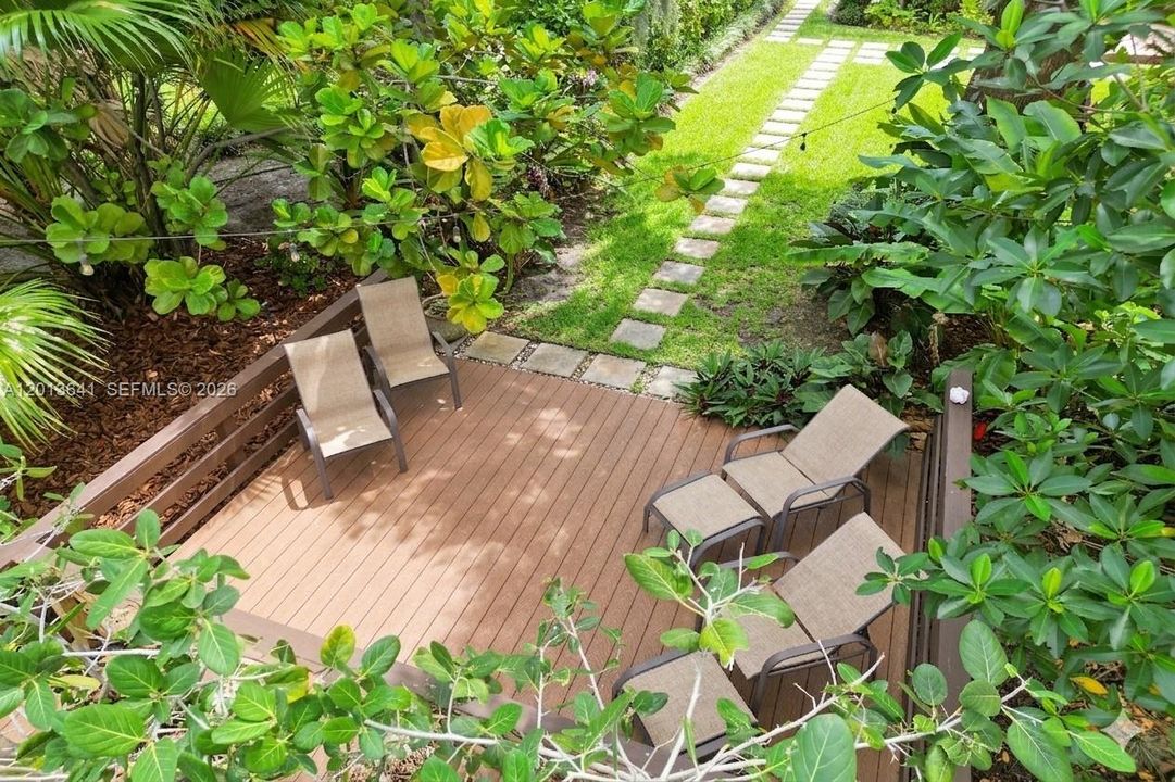 Enjoy a private deck with peaceful views of the canal and surrounding nature preserve.