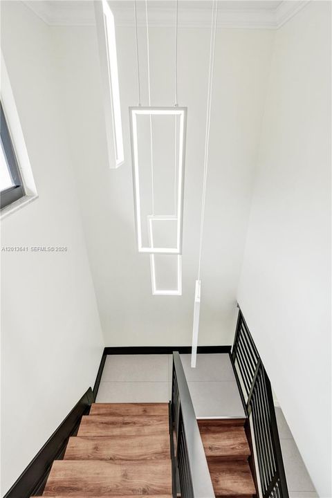 New added stair case, rails and custom LED light fixtures.