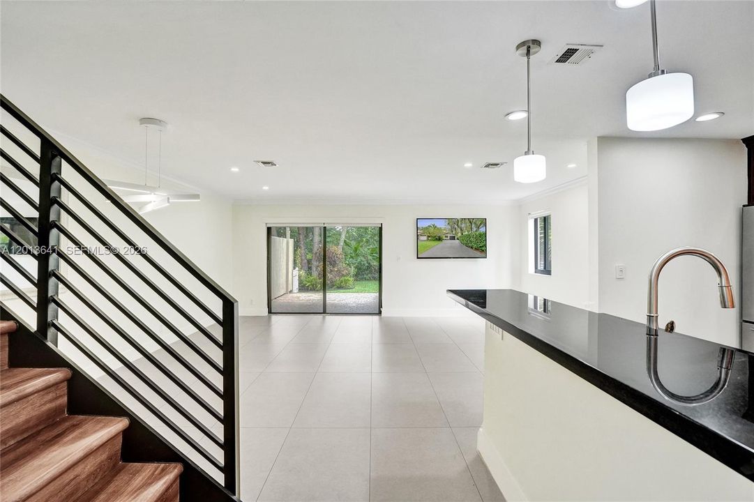 As you enter the home to the right  is the main living area.