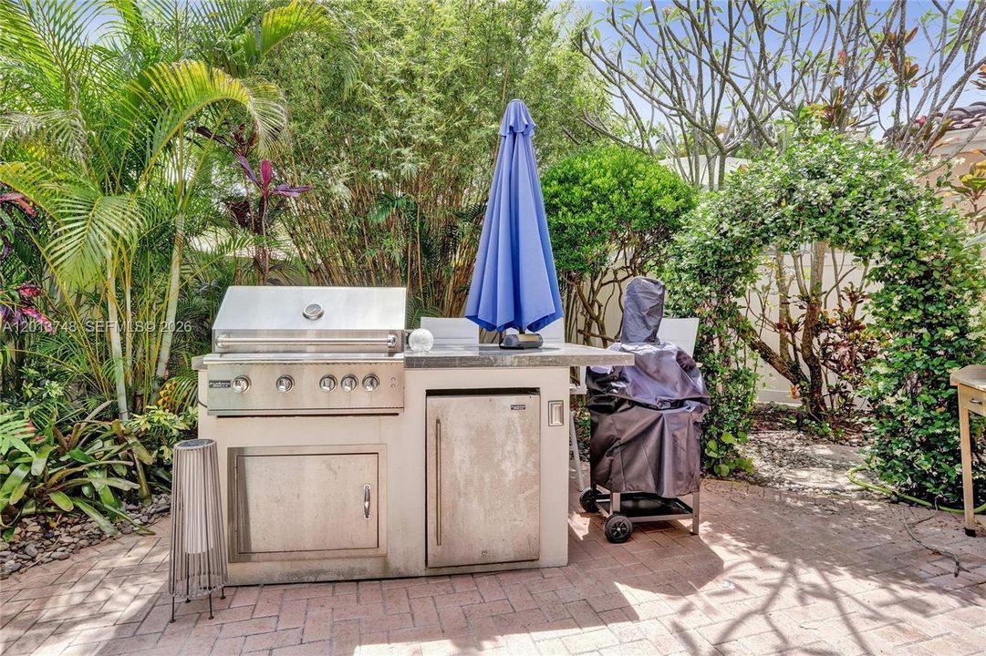 Outdoor Grill Area and Pizza Oven and Refrigerator!
